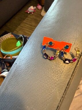 Gorgeous pair of pierced earrings. Gold tone, chain-link with beautiful gems.